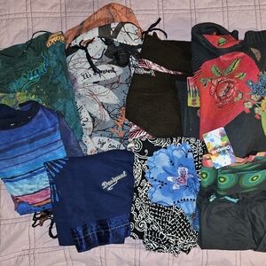 Eight Items Desigual clothing. 3 skirts. 2 shirts. 1 Scarf. 1 Shawl. 1 Cardigan